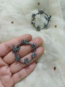 Brass round flying bird earring