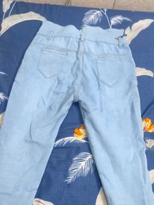 Light Wash Ripped Jeans