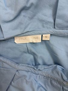 Light Blue Ruffled Off-Shoulder Top