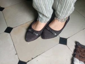 black flats and onion pink heels
