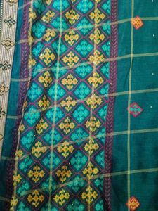 Elegant Green Saree with Intricate Weave