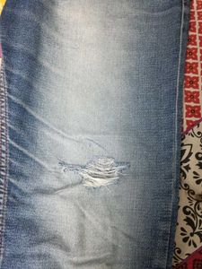 Distressed Blue Jeans
