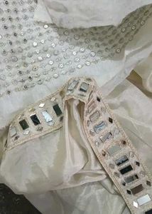 Elegant Cream Saree with Embellished Blouse