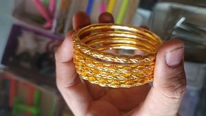 Set of 4 Elegant Gold Bangles
