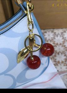 Coach Monogram Cherry Charm Shoulder Bag
