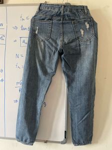Distressed Blue Denim Jeans