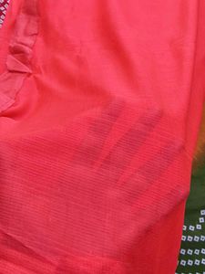 Elegant Coral Saree with Ruffle Detail