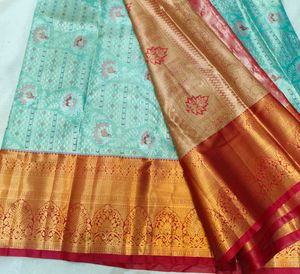 Elegant sea green Silk Saree with Gold Border