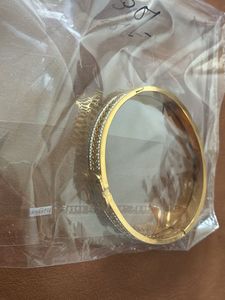 Gold Bangle with Crystal Embellishments