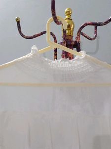 Elegant White Ruffled Sheer Blouse