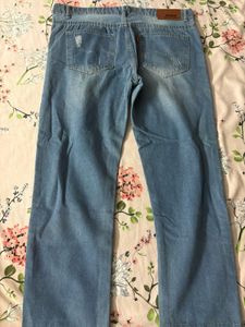 Distressed Light Wash Denim Jeans