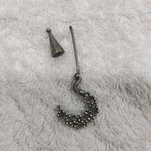 unique  silver look alike earing
