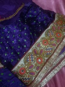 Exquisite Purple mirror work saree with designer b