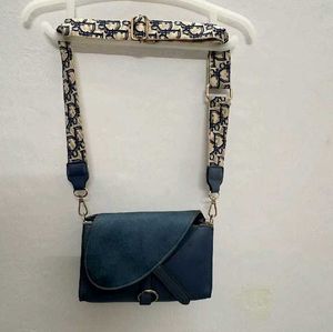 Stylish blue cross body bag