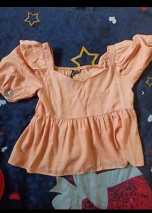 Peach Puff Sleeve Peplum Top