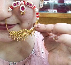 Elegant Gold Nath with Pearls &amp; Red Stones