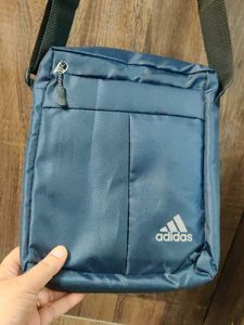 stylish Adidas crossbody/sling bag in navy blue. L