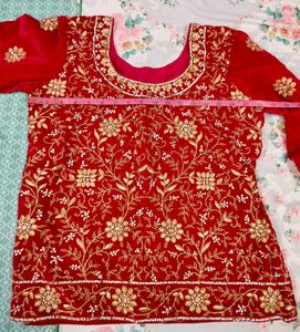 Rani pink Embroidered Lehenga Choli