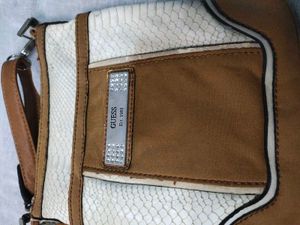 Authentic Guess snake patterned sling Bag