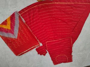 red rajasthani suit