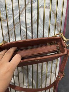 Chic Brown Handbag with Gold Chain Strap