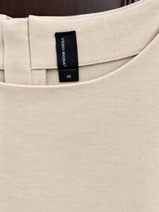 Sleeveless Cream Sheath Dress
