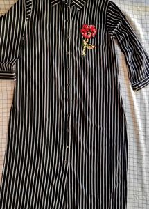 Chic Striped Button-Up Dress with Floral Accent