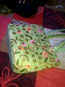 A Beautiful Handbag With Embroidery Design