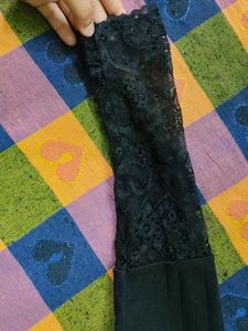 Chic Black Long Sleeve Top with Lace Detail