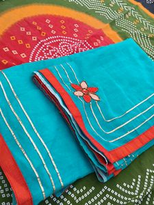 Elegant Turquoise Embellished Saree