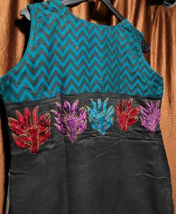 Stylish Sleeveless Embroidered Kurti