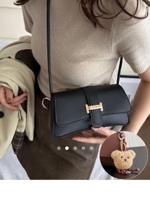 Chic Black Shoulder Bag with Charm