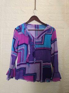 Vibrant Geometric Print Ruffle Blouse with inner