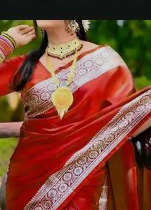 Elegant Red Saree with Intricate Border
