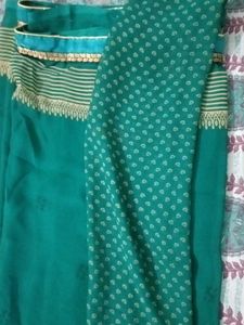 Elegant Teal saree with Intricate Print and unstit