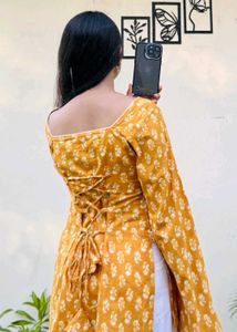 Pure cotton Yellow Printed Kurta with Lace Detail