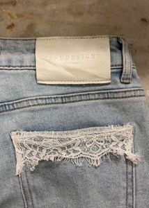 Light Wash Denim Jeans with Lace Detail