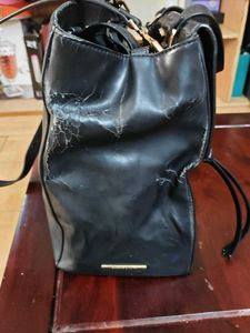 Classic Black Handbag with Gold Hardware