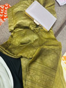 green saree with Clutch Bag