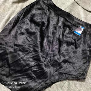 352510. Sleek Black Satin Skirt