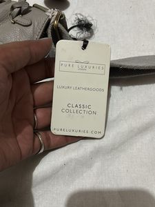 👜 Pure Luxuries London Crossbody Bag – Light Blue
