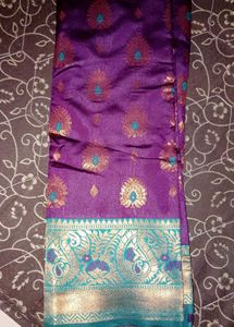 Beautiful Purple Saree with Teal Border