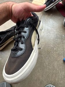 Puma Black & Gold Sneakers