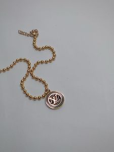 Elegant Gold Beaded Bracelet with Charm