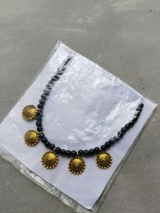 Black Beaded Necklace with Gold Pendants