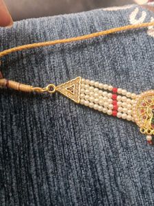 traditional pearl chokar jewelry set with red &amp; gr
