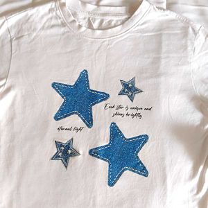 White T-Shirt with Blue Star Appliques