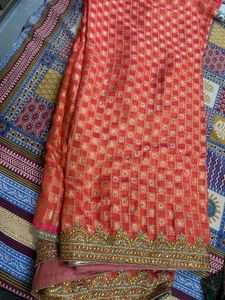 Beautiful Orange Saree with Gold Embellishments