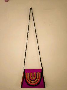 Vibrant Embroidered pink sling Bag