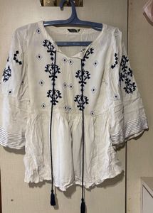 White Peplum Top